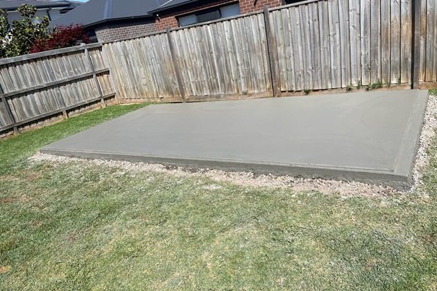 Newly installed concrete slab in the curing stage, protected and monitored by Empire Concreters