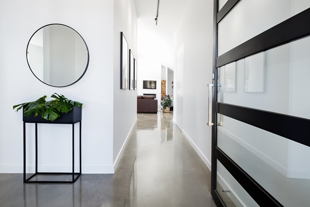 Bright office space with glossy polished concrete flooring