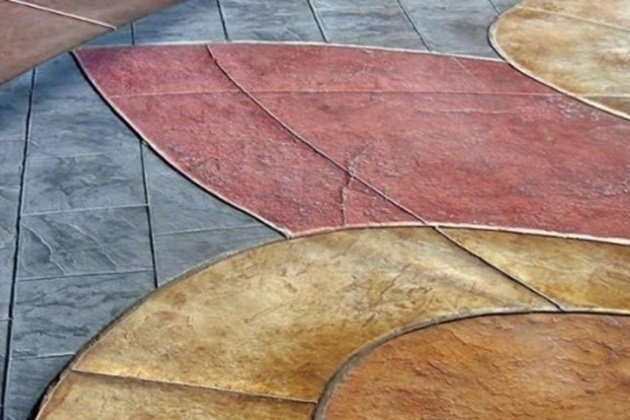 Decorative walkway featuring multiple colours of concrete in a pattern